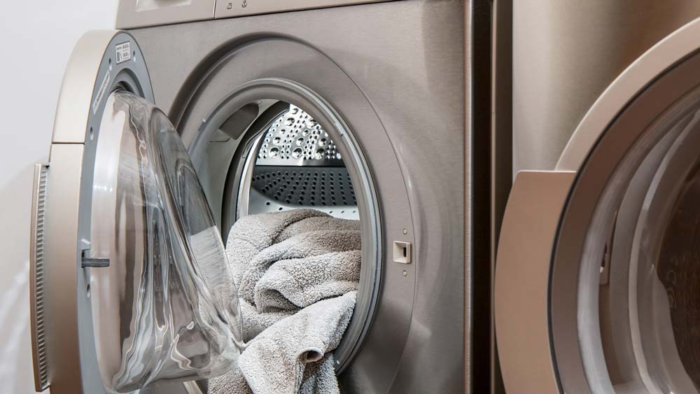 Washine machine full of freshly cleaned towels