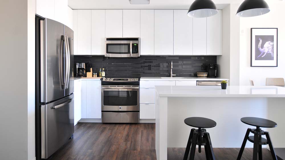 Modern kitchen with white cabinets