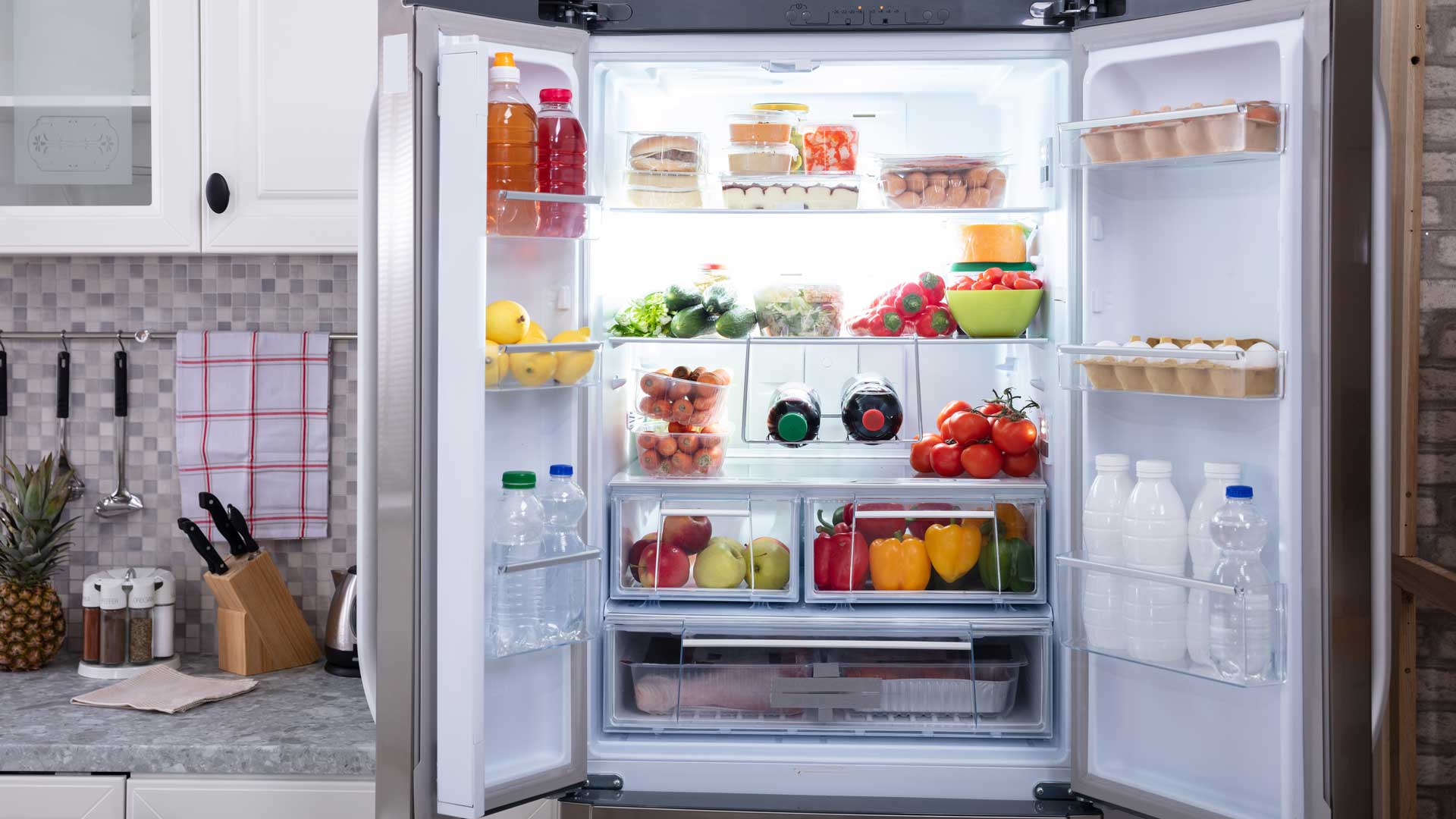 An open refrigerator full of food