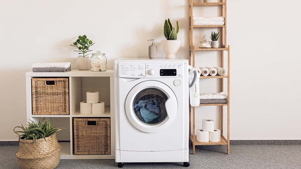 Laundry room with one white washer/dryer